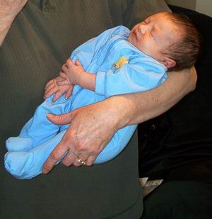 sleeping in Grandma's arms