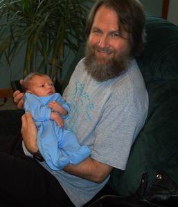 Grandpa gets to hold his first Grand Child!!